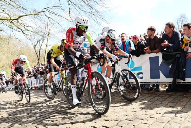 Eritrean Biniam Girmay Hailu of Intermarche-Wanty and Belgian Florian Vermeersch of UAE Team Emirates pictured in action on the Kemmelberg during the men elite Gent-Wevelgem - In Flanders Fields one day cycling race, 250.3 km from Ieper to Wevelgem, Sunday 30 March 2025. DAVIDxPINTENS  x117229788x
