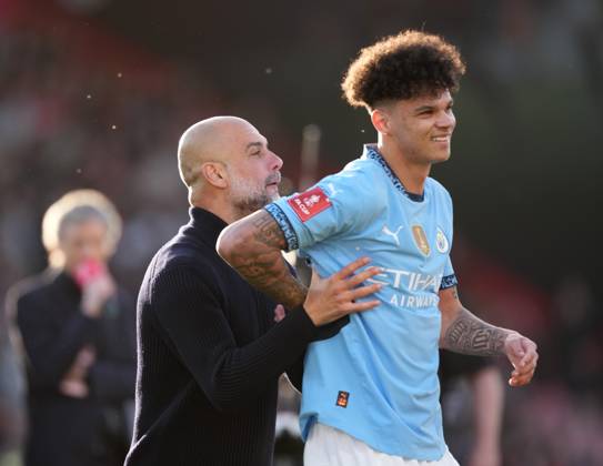 Bournemouth v Manchester City, FA Cup quarter-finals, Football, Vitality Stadium, Bournemouth, UK - 30 Mar 2025 Josep Guardiola manager of Manchester City pushes Nico O Reilly of Manchester City towards the fans at the end of the game. Bournemouth Vitality Stadium Bournemouth GBR, UK NEWSPAPERS OUT Copyright: xSeanxRyanx
