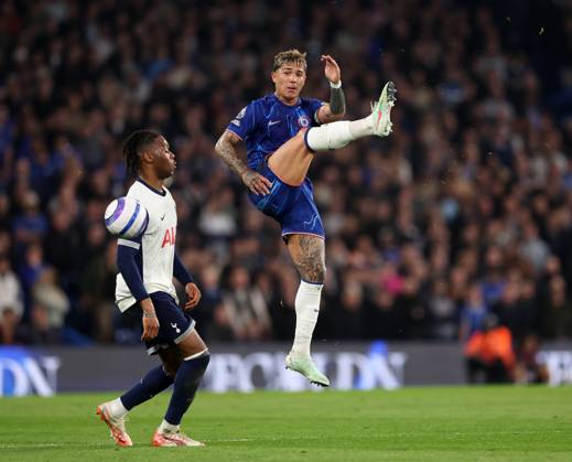 London, England, 3rd April 2025. Enzo Fernandez of Chelsea with Destiny Udogie of Tottenham during the Chelsea v Tottenham Premier League match at Stamford Bridge, London. Picture credit should read: David Klein Sportimage EDITORIAL USE ONLY. No use with unauthorised audio, video, data, fixture lists, club league logos or live services. Online in-match use limited to 120 images, no video emulation. No use in betting, games or single club league player publications. SPI_007_DK_Chelsea_Tottenham SPI-3792-0007