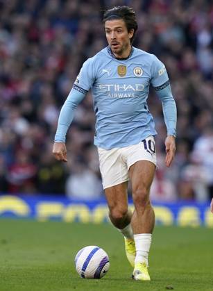 Manchester, England, 6th April 2025. Jack Grealish of Manchester City during the Manchester United, ManU vs Manchester City Premier League match at Old Trafford, Manchester. Picture credit should read: Andrew Yates Sportimage EDITORIAL USE ONLY. No use with unauthorised audio, video, data, fixture lists, club league logos or live services. Online in-match use limited to 120 images, no video emulation. No use in betting, games or single club league player publications. SPI_100_AY_United_City SPI-3814-0101