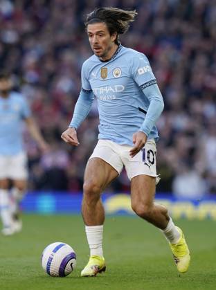 Manchester, England, 6th April 2025. Jack Grealish of Manchester City during the Manchester United, ManU vs Manchester City Premier League match at Old Trafford, Manchester. Picture credit should read: Andrew Yates Sportimage EDITORIAL USE ONLY. No use with unauthorised audio, video, data, fixture lists, club league logos or live services. Online in-match use limited to 120 images, no video emulation. No use in betting, games or single club league player publications. SPI_102_AY_United_City SPI-3814-0103