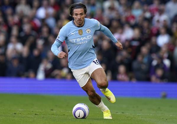 Manchester, England, 6th April 2025. Jack Grealish of Manchester City during the Manchester United, ManU vs Manchester City Premier League match at Old Trafford, Manchester. Picture credit should read: Andrew Yates Sportimage EDITORIAL USE ONLY. No use with unauthorised audio, video, data, fixture lists, club league logos or live services. Online in-match use limited to 120 images, no video emulation. No use in betting, games or single club league player publications. SPI_103_AY_United_City SPI-3814-0104