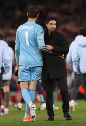 London, England, 8th April 2025. Mikel Arteta manager of Arsenal consoles Thibaut Courtois of Real Madrid during the Arsenal vs Real Madrid UEFA Champions League match at the Emirates Stadium, London. Picture credit should read: David Klein Sportimage EDITORIAL USE ONLY. No use with unauthorised audio, video, data, fixture lists, club league logos or live services. Online in-match use limited to 120 images, no video emulation. No use in betting, games or single club league player publications. SPI_090_DK_Arsenal_Real_Madrid SPI-3819-0081