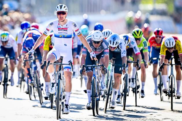 Belgian Tim Merlier of Soudal Quick-Step celebrates after winning the men s race of the 113th edition of the Scheldeprijs one day cycling event, 202,8 km from Terneuzen, the Netherlands to Schoten, Belgium on Wednesday 09 April 2025. ERICxLALMAND x120393904x