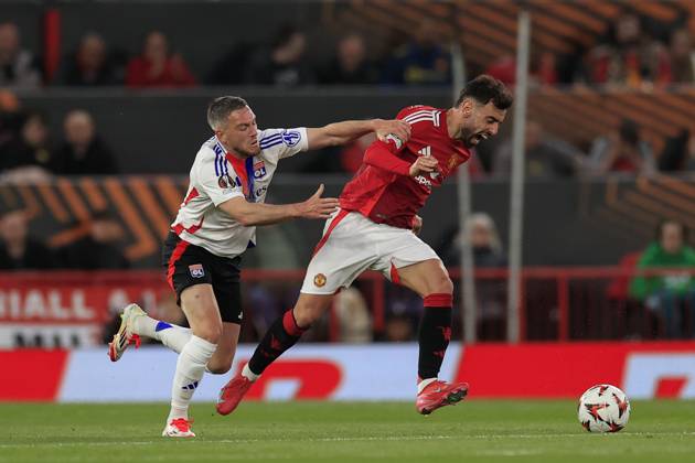 Manchester United, ManU v Olympique Lyonnais Europa League 17 04 2025. Quarter Final leg 2 of 2 Bruno Fernandes (8) of Manchester United is held back bu Jordan Veretout (7) of Olympique Lyonnais during the Europa League quarter final second leg match between Manchester United and Olympique Lyonnais at Old Trafford, Manchester, England on 17 April 2025. Manchester Old Trafford Greater Manchester England Editorial use only , Copyright: xConorxMolloyx PSI-21857-0048