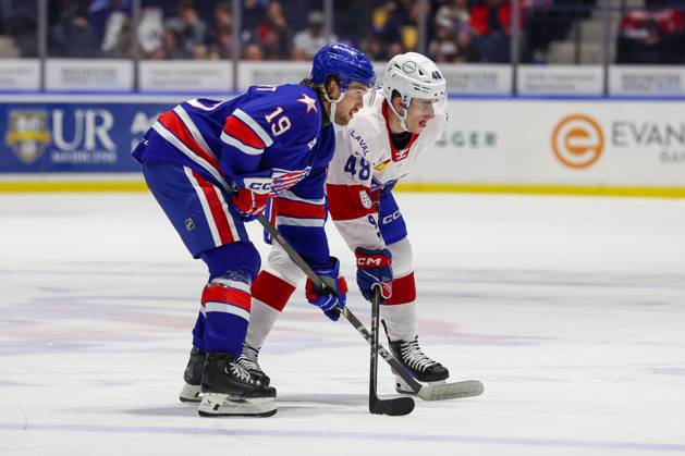 April 11th 2025: Laval Rocket forward Filip Mesar (48) battles with Rochester Americans forward Graham Slaggert (19) in the first period. The Rochester Americans hosted the Laval Rocket on Hall of Fame Night honoring Ryan Miller in an American Hockey League game at Blue Cross Arena in Rochester, New York. ( CSM) Rochester United States of America - ZUMAc04_ 20250411_zma_c04_112 Copyright: xJonathanxTencax