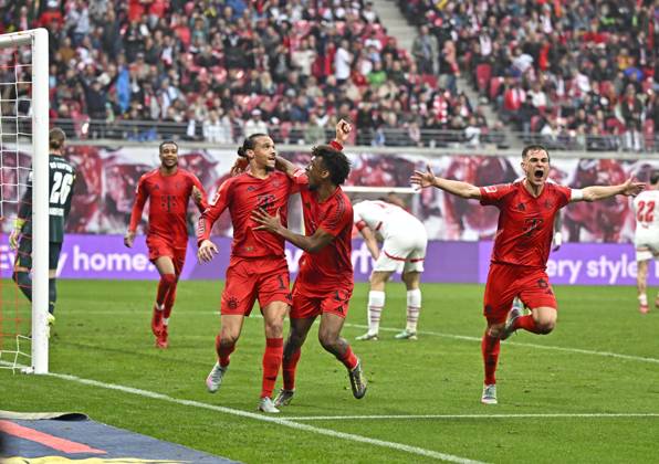 03 05 2025, Soccer 1 Bundesliga 2024 2025, Matchday 32, RB Leipzig FC Bayern Munich, in the Red Bull Arena Leipzig, Goal celebration v l Leroy Sane Bayern Munich and Kingsley Coman FC Bayern Munich and Joshua Kimmich FC Bayern Munich DFL and DFB regulations prohibit any use of photographs as image sequences and or quasi video