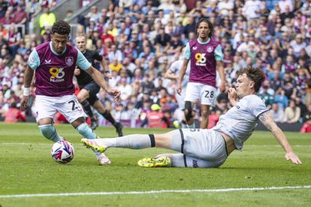 Burnley FC v Millwall FC - Sky Bet Championship Marcus Edwards 22 of Burnley FC is tackled by Jake Cooper 5 of Millwall F.C. during the Sky Bet Championship match between Burnley and Millwall at Turf Moor in Burnley, England, on May 3, 2025. Burnley Lancashire Copyright: xMIxNewsx originalFilename:0816158514st