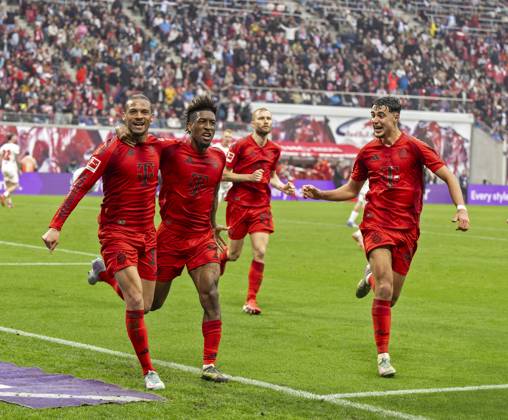 03 05 2025, Soccer 1 Bundesliga 2024 2025, Matchday 32, RB Leipzig FC Bayern Munich, in the Red Bull Arena Leipzig, Goal celebration Leroy Sane left, Bayern Munich after his 3 2 lead goal, with Kingsley Coman FC Bayern Munich and Aleksandar Pavlovic Bayern Munich