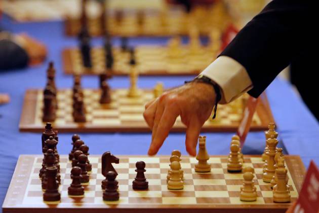 (250507) -- BUCHAREST, May 7, 2025 -- Former World Chess Champion Garry Kasparov of Russia makes a move during a demonstrative simultaneous chess game with Romanian children and teenager players at the official opening ceremony of the Grand Chess Tour 2025 tournament in Bucharest, Romania, May 6, 2025. (Photo by Xinhua) (SP)ROMANIA-BUCHAREST-GRAND CHESS TOUR 2025 CristianxCristel