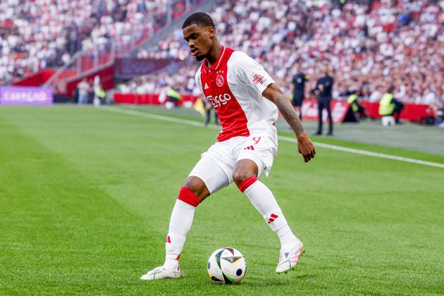 Jorrel Hato of Ajax dribbles with the ball , Eredivisie, AFC Ajax v NEC Nijmegen, Johan Cruijff ArenA, May 11, 2025, Amsterdam, Netherlands.