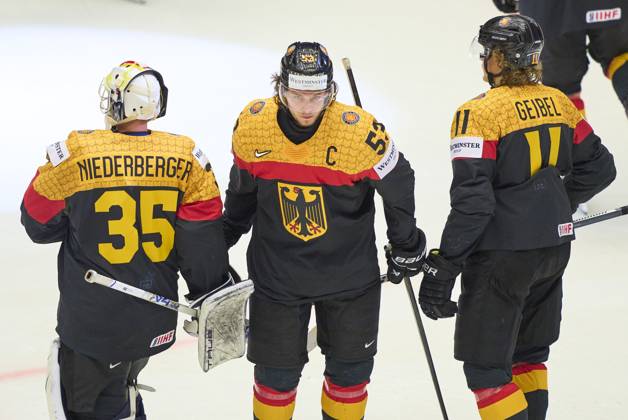 Team DEB sad Mathias Niederberger Nr. 35 goalie of Germany Moritz Seider 53 of Germany Korbinian Geibel 11 of Germany in the preliminary round match GERMANY - CZECHIA 0-6 of the IIHF Ice hockey, Eishockey World Championship, WM, Weltmeisterschaft Group B in Jyske Bank Boxen Arena in Herning, Denmark, May 17, 2025. Season 2024 2025