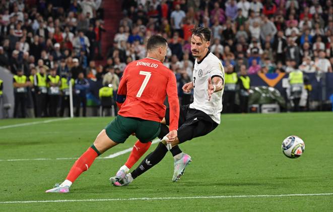04 06 2025, xjrdrx, Football UEFA Nations League 1 2 Final, Germany Portugal v l Cristiano Ronaldo Portugal , Robin Koch Deutsche Fussball Nationalmannschaft DFB DFL DFB REGULATIONS PROHIBIT ANY USE OF PHOTOGRAPHS as IMAGE SEQUENCES and or QUASI VIDEO Muenchen