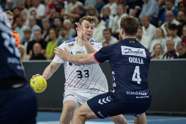 DAIKIN HBL SG Flensburg Handewitt vs Handball Sportverein Hamburg 08 06 25 Moritz Sauter Nr 33, Handball Sportverein Hamburg vs Johannes Golla Nr 04, SG Flensburg Handewitt DAIKIN HBL SG Flensburg Handewitt vs Handball Sportverein Hamburg, GP JOULE Arena on 08 06 25 Copyright: xBEAUTIFULxSPORTS MarioxM.xKobergx