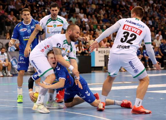 BAU 08 06 2025 Stuttgart Handball TVB Stuttgart vs SC DHFK Leipzig, front from l Moritz Preuß Leipzig , Torben Matzken Stuttgart