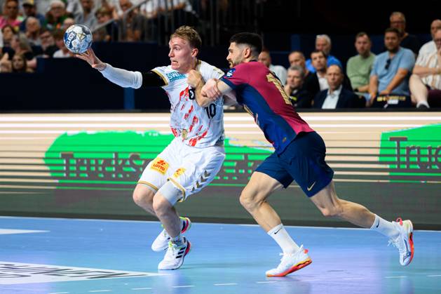 Cologne, Germany Handball EHF CL Final 4 semi-final Barca SC Magdeburg from left in duel Gisli Thorgeir Kristjansson SC Magdeburg and Blaz Janc Barcelona Cologne Lanxess Arena Nordrhein Westfalen Germany