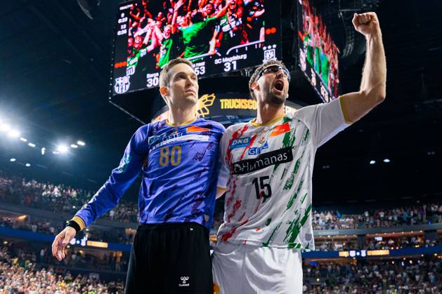 Cologne, Germany Handball EHF CL Final 4 Semifinal Barca SC Magdeburg Goalkeeper Nikola Portner SC Magdeburg , Antonio Serradilla Cuenca SC Magdeburg Final cheer Final cheer Emotion Joy , Final score 30 31 on the scoreboard Cologne Lanxess Arena North Rhine Westphalia Germany