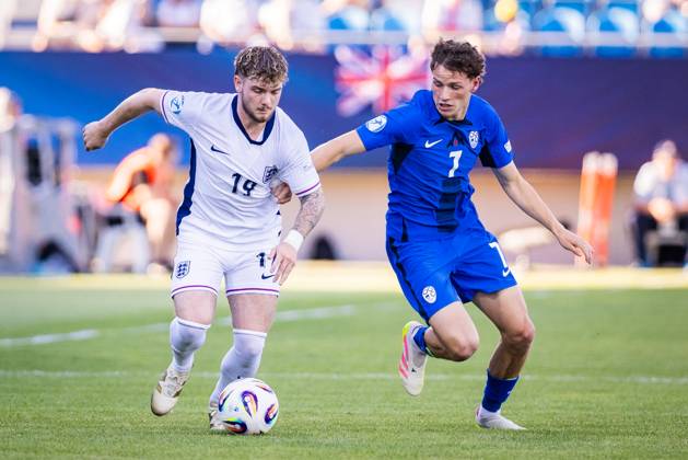 ENGLAND U21, U 21 - SLOVENIA U21 Harvey Elliott of England and Tjas Begic of Slovenia during the UEFA European Under-21 Championship 2025 Group B football match between England U21 and Slovenia U21. Stadium Nitra Arena, Nitra, Slovakia, June 15, 2025. Photo by Branislav Racko Copyright: xx 080A3346