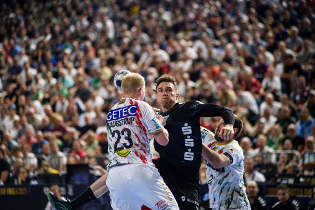 COLOGNE, GERMANY - 15 JUNE, 2025: Magnus Saugstrup Jensen, Mathias Gidsel - The final match of TruckScout24 EHF FINAL4 Fuchse Berlin vs SC Magdeburg at Lanxess Arena.  Copyright: xVITALIIxKLIUIEVx