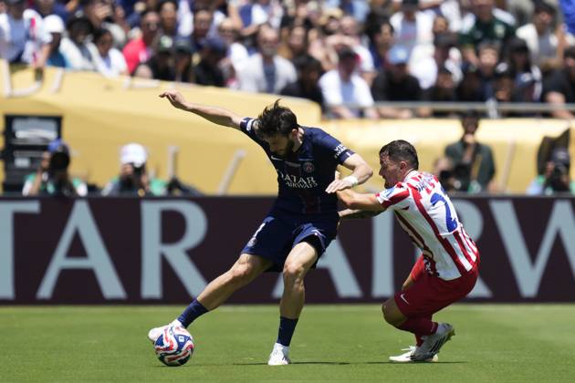 Paris Saint-Germain FC v Club Atletico de Madrid: Group B - FIFA Club World Cup 2025 PASADENA, CALIFORNIA - JUNE 15: Khvicha Kvaratskhelia left winger of PSG and Georgia and Javi Galan left-back of Atletico de Madrid and Spain compete for the ball during the FIFA Club World Cup 2025 group B match between Paris Saint-Germain FC and Club Atletico de Madrid at Rose Bowl Stadium on June 15, 2025 in Pasadena, California. Jose Hernandez Anadolu California United States. Editorial use only. Please get in touch for any other usage. Copyright: x2025xAnadoluxJosexHernandezx