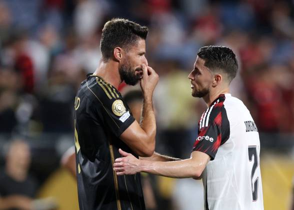Orlando, USA, 24th June 2025. Oliver Giroud of Los Angeles FC with former teammate Jorginho of CR Flamengo during the Los Angeles FC vs CR Flamengo FIFA Club World Cup match at Camping World Stadium, Orlando. Picture credit should read: David Klein Sportimage EDITORIAL USE ONLY. No use with unauthorised audio, video, data, fixture lists, club league logos or live services. Online in-match use limited to 120 images, no video emulation. No use in betting, games or single club league player publications. SPI_031_DK_LA_FC_Flamengo SPI-3991-0031