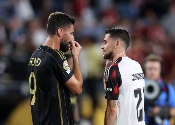Orlando, USA, 24th June 2025. Oliver Giroud of Los Angeles FC with former teammate Jorginho of CR Flamengo during the Los Angeles FC vs CR Flamengo FIFA Club World Cup match at Camping World Stadium, Orlando. Picture credit should read: David Klein Sportimage EDITORIAL USE ONLY. No use with unauthorised audio, video, data, fixture lists, club league logos or live services. Online in-match use limited to 120 images, no video emulation. No use in betting, games or single club league player publications. SPI_032_DK_LA_FC_Flamengo SPI-3991-0032