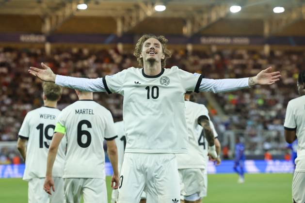 Nick Woltemade Germany celebrates after scoring his teams second goal, UEFA European Under 21 Championship 2025 Semi Final, Germany v France, Košicka futbalova arà na, June 25, 2025 in Košice, Slovakia Photo by Marco Steinbrenner DeFodi Images Nick Woltemade Germany celebrates after scoring his teams second goal, UEFA European Under 21 Championship 2025 Semi Final, Germany v France, Košicka futbalova arà na, June 25, 2025 in Košice, Slovakia Photo by Marco Steinbrenner DeFodi Images