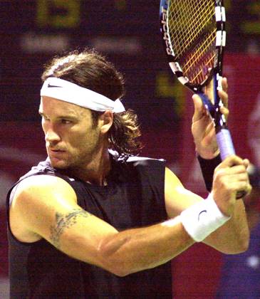 Jan 08, 2005; Madras, INDIA; Spain s Carlos Moya hits a ball against his countrymate Guillermo Garcia-Lopez, in a semifinal match of the ATP, Tennis Herren Chennai Open in Madras on January 8, 2005. Moya won the match. Madras INDIA Copyright: xTCxMalhotrax