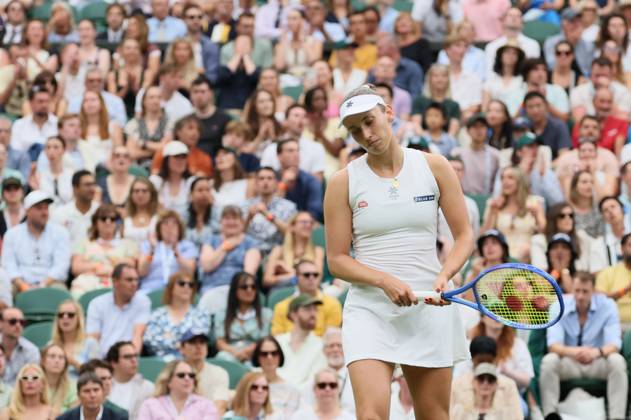 Belgian Elise Mertens reacts during a tennis match against Belarusian Sabalenka, in the round of 16 of the women s singles at the 2025 Wimbledon grand slam tournament, Sunday 06 July 2025 at the All England Tennis Club, in South-West London, Britain. BENOITxDOPPAGNE x128549406x