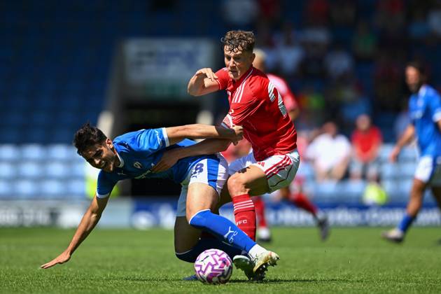 Chesterfield v Nottingham Forest - Pre-Season Friendly Ryan Yates of Nottingham Forest competes with Matt Dibley-Dias of Chesterfield during the pre-season friendly match between Chesterfield and Nottingham Forest at the SMH Group Stadium in Chesterfield, England, on July 12, 2025. Chesterfield Derbyshire United Kingdom Copyright: xMIxNewsx originalFilename:fletcher-chesterf250712_npmpB