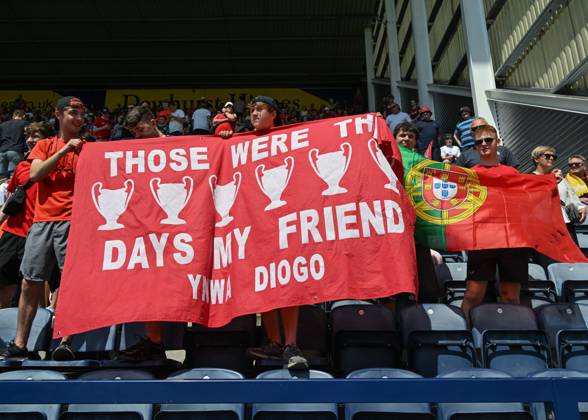 Preston, England, 13th July 2025. Liverpool fans holding a banner in tribute of Liverpool player Diogo Jota ahead of the Preston North End vs Liverpool Pre Season Friendly match at Deepdale, Preston. Picture credit should read: Cody Froggatt Sportimage EDITORIAL USE ONLY. No use with unauthorised audio, video, data, fixture lists, club league logos or live services. Online in-match use limited to 120 images, no video emulation. No use in betting, games or single club league player publications. SPI_016_CF_PRESTON_V_LIVERPOOL SPI-4018-0016