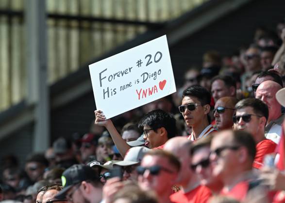Preston, England, 13th July 2025. Liverpool fans holding a banner in tribute of Liverpool player Diogo Jota ahead of the Preston North End vs Liverpool Pre Season Friendly match at Deepdale, Preston. Picture credit should read: Cody Froggatt Sportimage EDITORIAL USE ONLY. No use with unauthorised audio, video, data, fixture lists, club league logos or live services. Online in-match use limited to 120 images, no video emulation. No use in betting, games or single club league player publications. SPI_021_CF_PRESTON_V_LIVERPOOL SPI-4018-0020