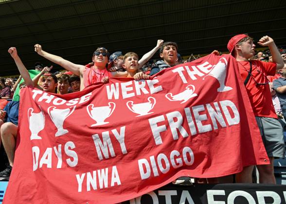 Preston, England, 13th July 2025. Liverpool fans holding a banner in tribute of Liverpool player Diogo Jota ahead of the Preston North End vs Liverpool Pre Season Friendly match at Deepdale, Preston. Picture credit should read: Cody Froggatt Sportimage EDITORIAL USE ONLY. No use with unauthorised audio, video, data, fixture lists, club league logos or live services. Online in-match use limited to 120 images, no video emulation. No use in betting, games or single club league player publications. SPI_020_CF_PRESTON_V_LIVERPOOL SPI-4018-0023