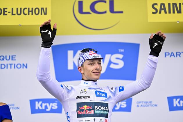 German Florian Lipowitz of RedBull-BORA-hansgrohe celebrates on the podium in the white jersey for best young rider after stage 14 of the 2025 Tour de France cycling race, from Pau to Luchon-Superbagneres (183 km), on Saturday 19 July 2025 in France. The 112th edition of the Tour de France starts on Saturday 5 July in Lille, France, and will finish in Paris, France on the 27th of July. DIRKxWAEM  x129574440x