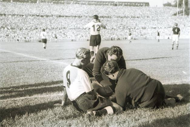 Football World Cup in the Switzerland Final Round Group 2 Hungary Germany 8 3 3 1 u B Z the injured German Paul Mebus Number 9 in the Center is Helmut Rahn 12 ger and left in Background is Fritz Walter 16 ger 20 06 1954 in Basel St Jakob Stadium Switzerland