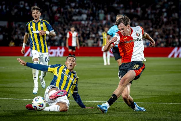 Fenerbahce SK defender Mert Muldur, Feyenoord Rotterdam forwarder Leo Sauer during the match Feyenoord Fenerbahce at the Kuip Stadium for the third qualifying round champions league season 2025 2026 in Rotterdam, Netherlands on 6 august 2025, photo by Marcel van Dorst EYE4images DeFodi Images