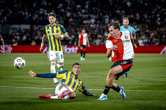 Fenerbahce SK defender Mert Muldur, Feyenoord Rotterdam forwarder Leo Sauer during the match Feyenoord Fenerbahce at the Kuip Stadium for the third qualifying round champions league season 2025 2026 in Rotterdam, Netherlands on 6 august 2025, photo by Marcel van Dorst EYE4images DeFodi Images