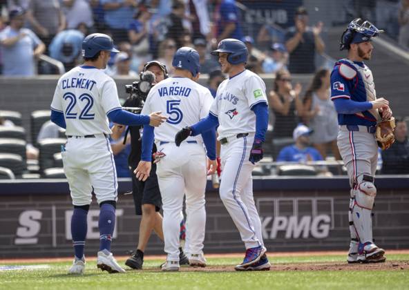 August 16, 2025, Toronto, On, Canada: Toronto Blue Jays Myles Straw (3) celebrates his home run with teammates Ernie Clement (22) and Daulton Varsho (5) during the second inning against the Texas Rangers in Toronto, Saturday, Aug. 16, 2025. Toronto Blue Jays Vs Texas Rangers  - ZUMAc35_ 20250816_zaf_c35_125 Copyright: xTaraxWaltonx