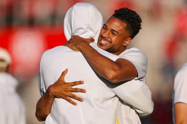 2025 08 18, Football, 1 round DFB Cup, Rot Weiss Essen Borussia Dortmund, Stadion Hafenstraße, Season 2025 2026 Almugera Kabar BVB 42 hugs Filippo Mane BVB 39 during the pitch inspection DFB regulations prohibit any use of photographs as image sequences and or quasi video North Rhine-Westphalia Germany
