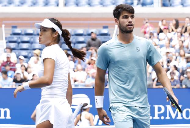 Emma Raducanu of Great Britain and Carlos Alcaraz of Spain react after a point in their round one match against Jessica Pegula and Jack Draper of Great Britain in the mixed doubles championships in Arthur Ashe Stadium at the 2025 US Open Tennis Championship at the USTA Billie Jean King National Tennis Center in New York City on Tuesday, August 19, 2025 in New York City. Jessica Pegula and Jack Draper of Great Britain defeated Emma Raducanu of Great Britain and Carlos Alcaraz of Spain 4-2, 4-2 and advance to the quarterfinals.  NYP20250819103 JOHNxANGELILLO