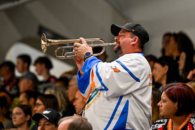 22 08 2025, Eishalle Linz, AUT, ice hockey preparation test match, Black Wings Linz AUT vs HK Nitra SVK , in the picture a fan of the Black Wings Linz with a trumpet Linz Oberoesterreich Austria