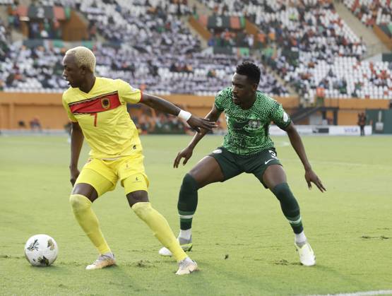 Nigeria v Angola - Africa Cup of Nations ABIDJAN, IVORY COAST - FEBRUARY 02: Zaidu Sanusi (R) of Nigeria in action against Gilberto (L) of Angola during the Africa Cup of Nations quarterfinal match between Nigeria and Angola at Felix Houphouet Boigny Stadium in Abidjan, Ivory Coast on February 02, 2024. Côte d Ivoire World. Editorial use only. Please get in touch for any other usage. Copyright: x2025xAnadoluxYvanxGabonx