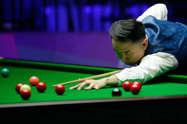WUHAN, CHINA - AUGUST 24: Xiao Guodong of China plays a shot in the first round match against Mink Nutcharut of Thailand on day 1 of the 2025 Wuhan Open Qualifiers at Optics Valley Gymnasium of HUST on August 24, 2025 in Wuhan, Hubei Province of China.  Copyright: xTaixChengzhex 111586616981