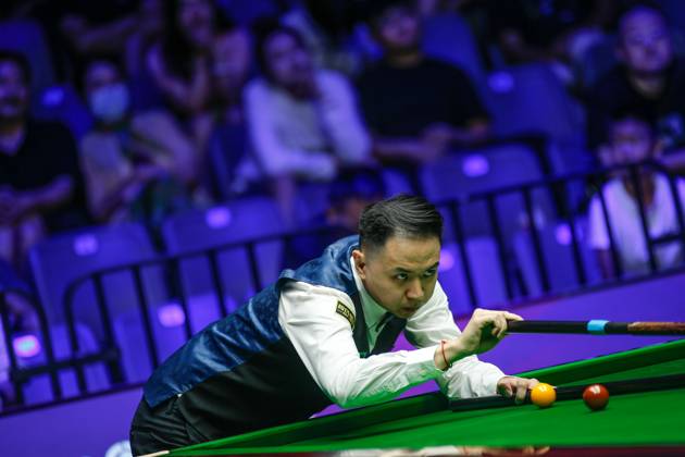WUHAN, CHINA - AUGUST 24: Xiao Guodong of China plays a shot in the first round match against Mink Nutcharut of Thailand on day 1 of the 2025 Wuhan Open Qualifiers at Optics Valley Gymnasium of HUST on August 24, 2025 in Wuhan, Hubei Province of China.  Copyright: xTaixChengzhex 111586616985