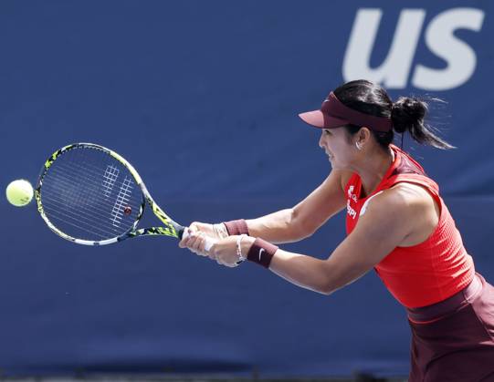 Alexandra Eala of the Philippines returns a ball to Cristina Bucsa Spain in the first set of their second round match on court 7 on day 4 at the 2025 US Open Tennis Championship at the USTA Billie Jean King National Tennis Center in New York City on Wednesday, August 27, 2025. Bucsa defeated Eala in straight sets. NYP20250827131 JOHNxANGELILLO