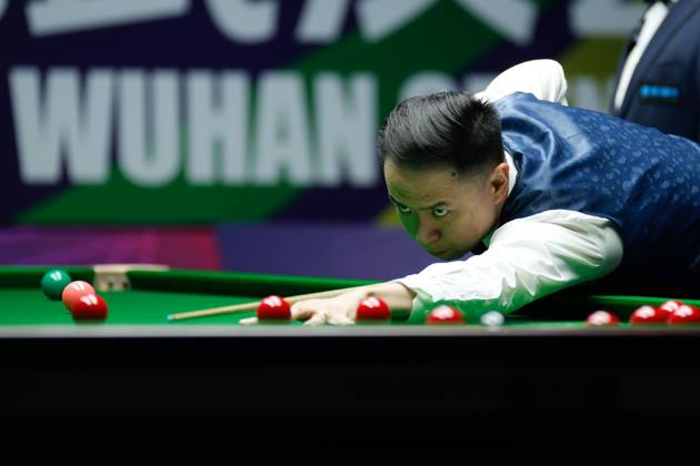 WUHAN, CHINA - AUGUST 28: Xiao Guodong of China plays a shot in the Quarterfinal match against Stan Moody of England on day 5 of the 2025 Wuhan Open at Optics Valley Gymnasium of HUST on August 28, 2025 in Wuhan, Hubei Province of China.  Copyright: xTaixChengzhex 111587441741