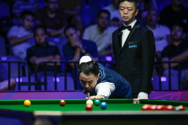 WUHAN, CHINA - AUGUST 29: Xiao Guodong of China plays a shot in the Semifinal match against Mark J Williams of Wales on day 6 of the 2025 Wuhan Open at Optics Valley Gymnasium of HUST on August 29, 2025 in Wuhan, Hubei Province of China.  Copyright: xTaixChengzhex 111587654940