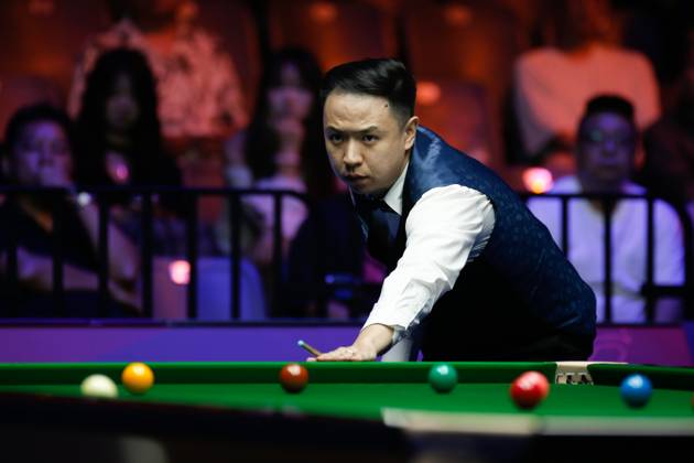 WUHAN, CHINA - AUGUST 30: Xiao Guodong of China plays a shot in the Final match against Gary Wilson of England on day 7 of the 2025 Wuhan Open at Optics Valley Gymnasium of HUST on August 30, 2025 in Wuhan, Hubei Province of China.  Copyright: xTaixChengzhex 111587811803