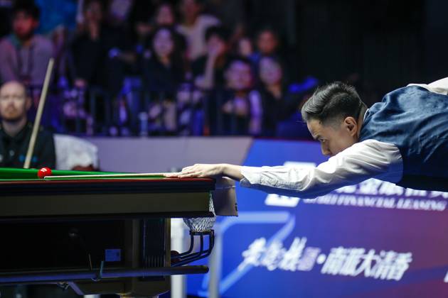 WUHAN, CHINA - AUGUST 30: Xiao Guodong of China plays a shot in the Final match against Gary Wilson of England on day 7 of the 2025 Wuhan Open at Optics Valley Gymnasium of HUST on August 30, 2025 in Wuhan, Hubei Province of China.  Copyright: xTaixChengzhex 111587868020