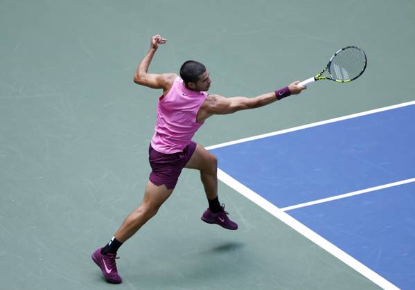 Carlos Alcaraz of Spain returns a ball to Jiri Lehecka of Czechia in the first set before defeating Lehecka in straight sets in their quarterfinal match in Arthur Ashe Stadium on day 10 at the 2025 US Open Tennis Championship at the USTA Billie Jean King National Tennis Center in New York City on Tuesday, September 2, 2025.  NYP20250902113 JOHNxANGELILLO